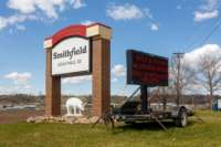 A sign outside the Smithfield Foods pork processing plant in South Dakota, one of the country's largest known Coronavirus clusters, is seen on April 21, 2020, in Sioux Falls, South Dakota.