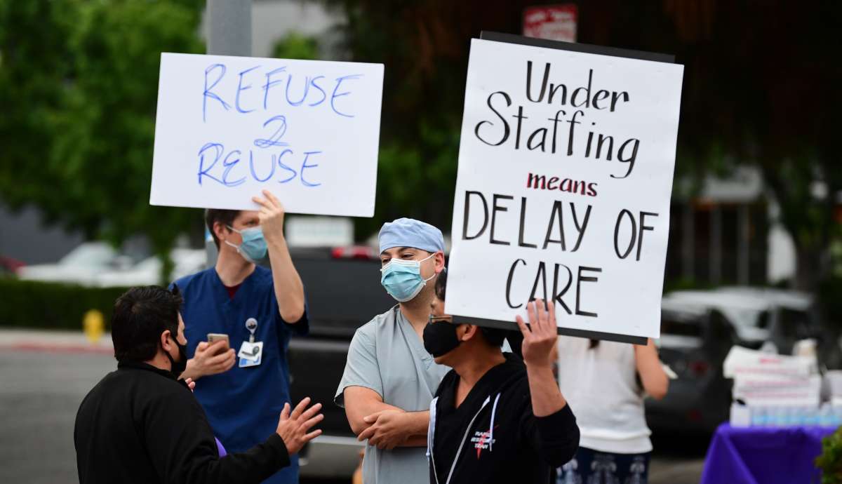 Nurses stage a protest with support from the registered nurses union, SEIU Local 121RN, outside the West Hills Hospital on June 18, 2020, in West Hills, California.