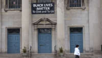 A Black Lives Matter sign hangs in front of the First Congregational Church of Evanston, UCC on March 23, 2021 in Evanston, Illinois.