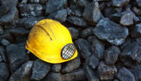 Coal mining helmet on coal