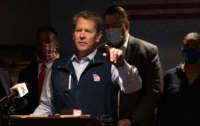 Georgia Gov. Brian Kemp speaks at a news conference about the state's new Election Integrity Law at AJ’s Famous Seafood and Poboys on April 10, 2021, in Marietta, Georgia.