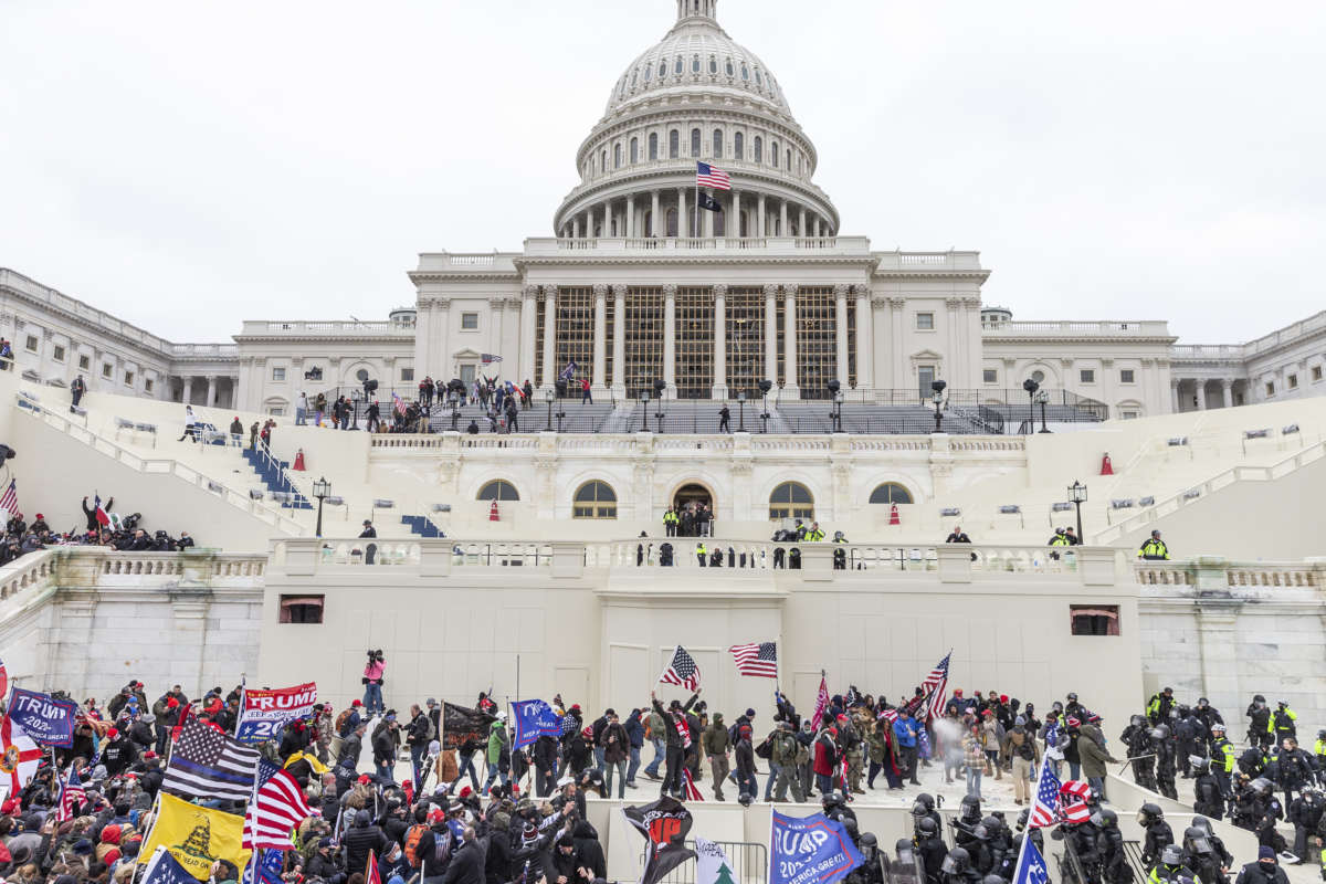 Pro-Trump protesters seen on and around Capitol building on January 6, 2021.