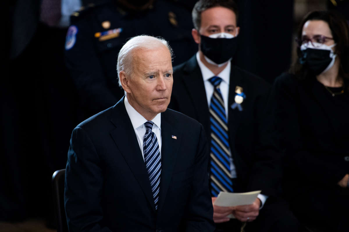 President Joseph Robinette Biden looks onward during a memorial service