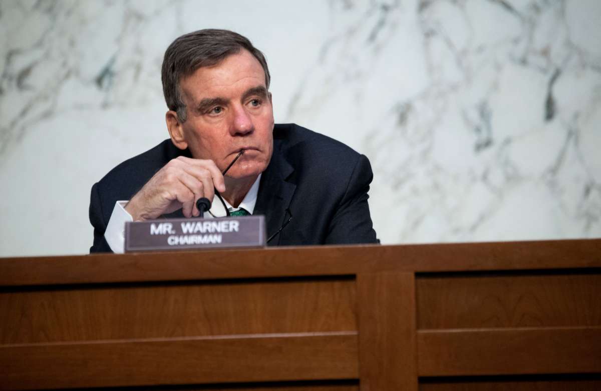 Sen. Mark Warner, Democrat of Virginia and Chairman of the Senate Select Committee on Intelligence, holds a hearing on Capitol Hill in Washington, D.C., April 14, 2021.