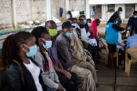 People wait to be vaccinated during Phase 1 of the COVID-19 vaccination program at Mbagathi Hospital, in Nairobi, Kenya, on April 12, 2021.