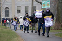 Union workers protest layoffs at Harvard University on January 14, 2021, in Cambridge, Massachusetts.