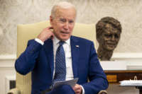 President Joe Biden meets with members of the Congressional Asian Pacific American Caucus Executive Committee in the Oval Office at the White House on April 15, 2021, in Washington, D.C.