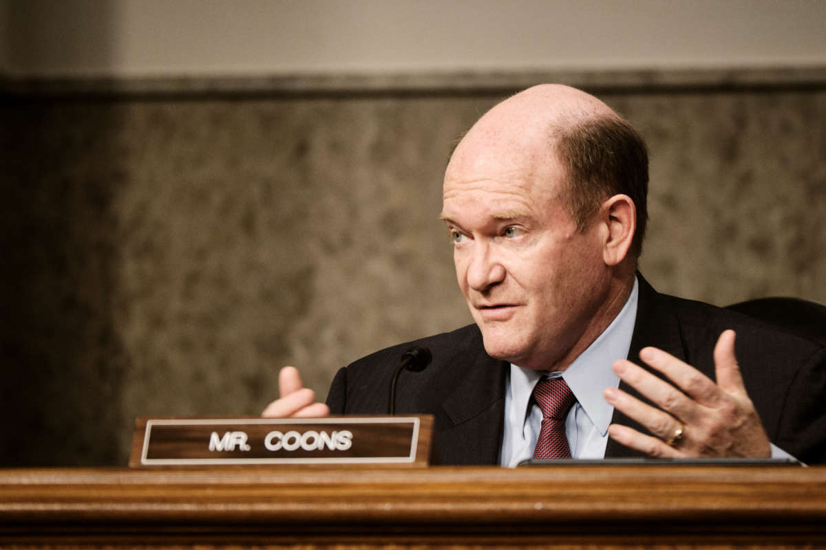 During a virtual event, Sen. Chris Coons invoked the January 6 insurrection to justify his opposition to temporarily suspending restrictive intellectual property protections.