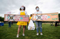 Demonstrators hold a rally to "Free the Vaccine," calling on the U.S. to commit to a global coronavirus vaccination plan that includes sharing vaccine formulas with the world to help ensure that every nation has access to a vaccine, on the National Mall in Washington, D.C., May 5, 2021.