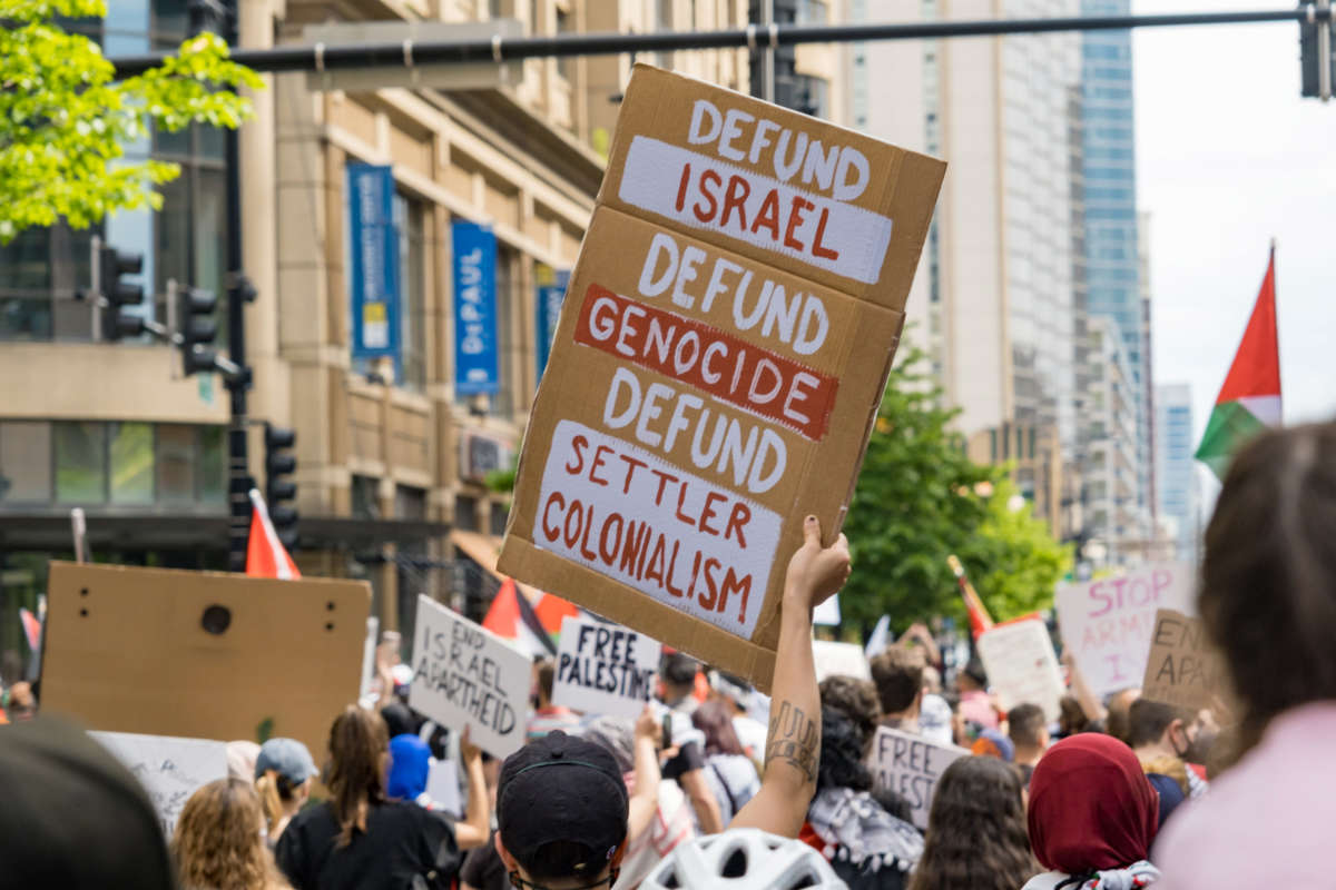 People protest in solidarity with Palestinian liberation on May 16, 2021, in Chicago.