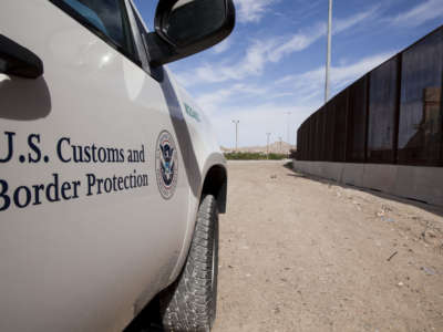 A U.S. Customs and Border Protection vehicle patrols the border fence in El Paso, Texas, on August 23, 2019.
