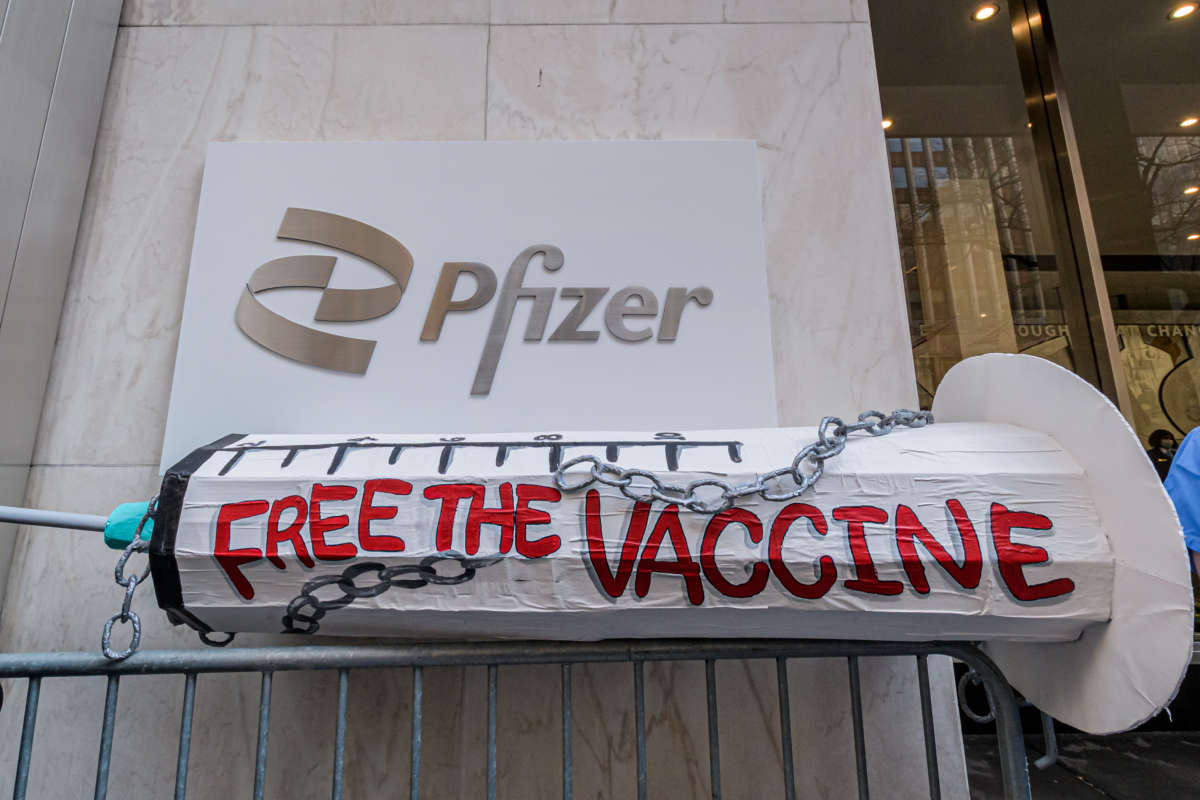 A syringe prop seen displayed at the protest on March 11, 2021, outside Pfizer Worldwide Headquarters in Manhattan.