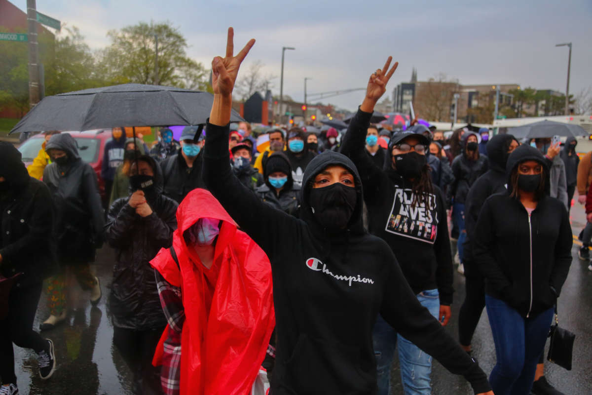 Demonstrators march towards Boston Police Headquarter to protest the police-perpetrated killing of 16-year-old Ma'Khia Bryant who was shot by Columbus Police on April 21, 2021. This march was initially organized to celebrate the life of George Floyd following the verdict of Derek Chauvin.