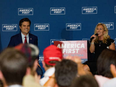 Representatives Matt Gaetz and Marjorie Taylor Greene speak at an "America First" rally on May 27, 2021, in Dalton, Georgia.