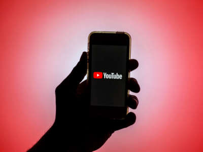 The YouTube app is seen displayed on a smartphone screen.