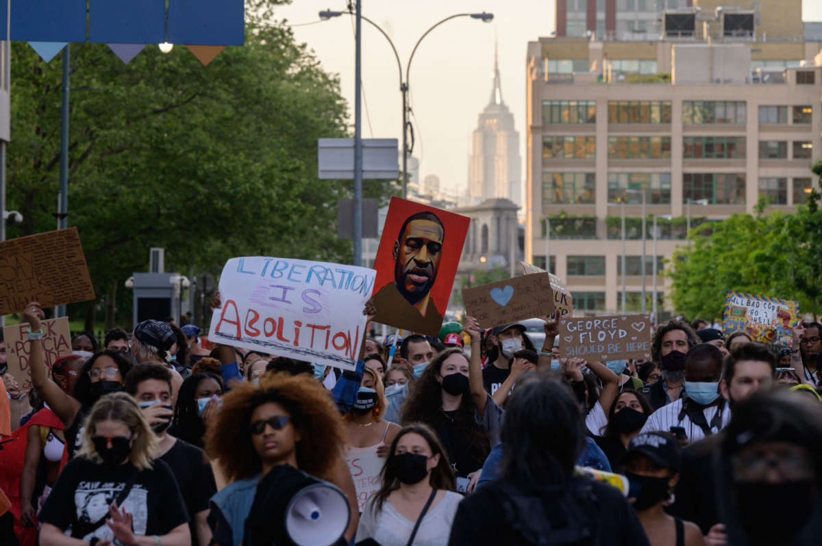 Black Lives Matter protesters march on the anniversary of the death of George Floyd, in Brooklyn, New York, on May 25, 2021.