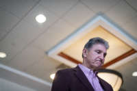 Sen. Joe Manchin is interviewed after a news conference at the Marriott Hotel at Waterfront Place on June 3, 2021, in Morgantown, West Virginia.