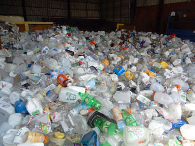 Plastic containers piled up at the recycling center in Wellsville, New York.