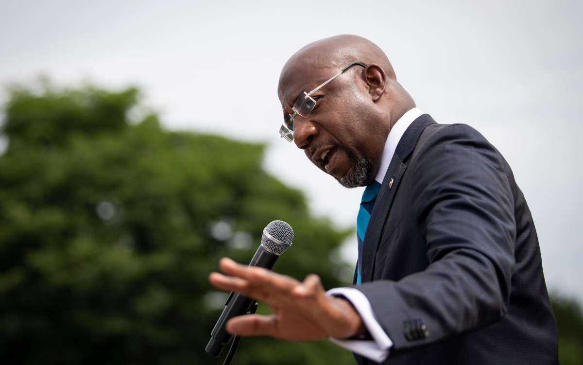 Sen. Raphael Warnock speaks at a rally outside the Supreme Court in Washington, D.C., on June 9, 2021.