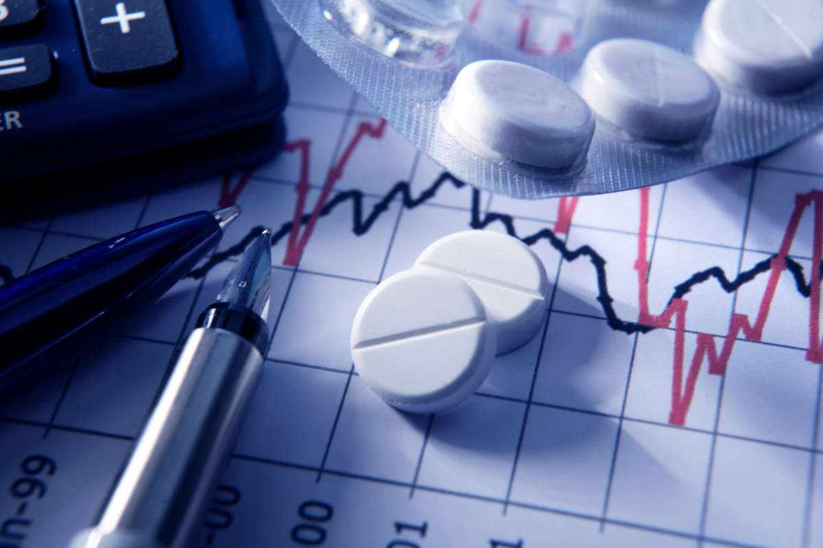 Pharmaceuticals, pills and finance charts