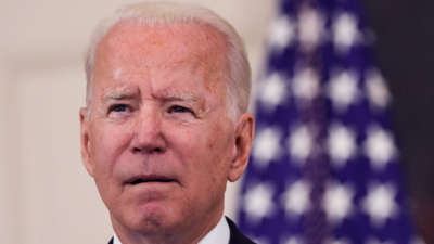 Joe Biden does something with his mouth to imply that he's in thought, but not particularly deeply