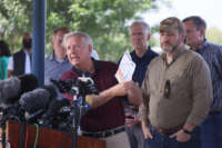 Sen. Lindsey Graham speaks to the media after a tour of part of the Rio Grande on a Texas Department of Public Safety boat on March 26, 2021, in Mission, Texas.