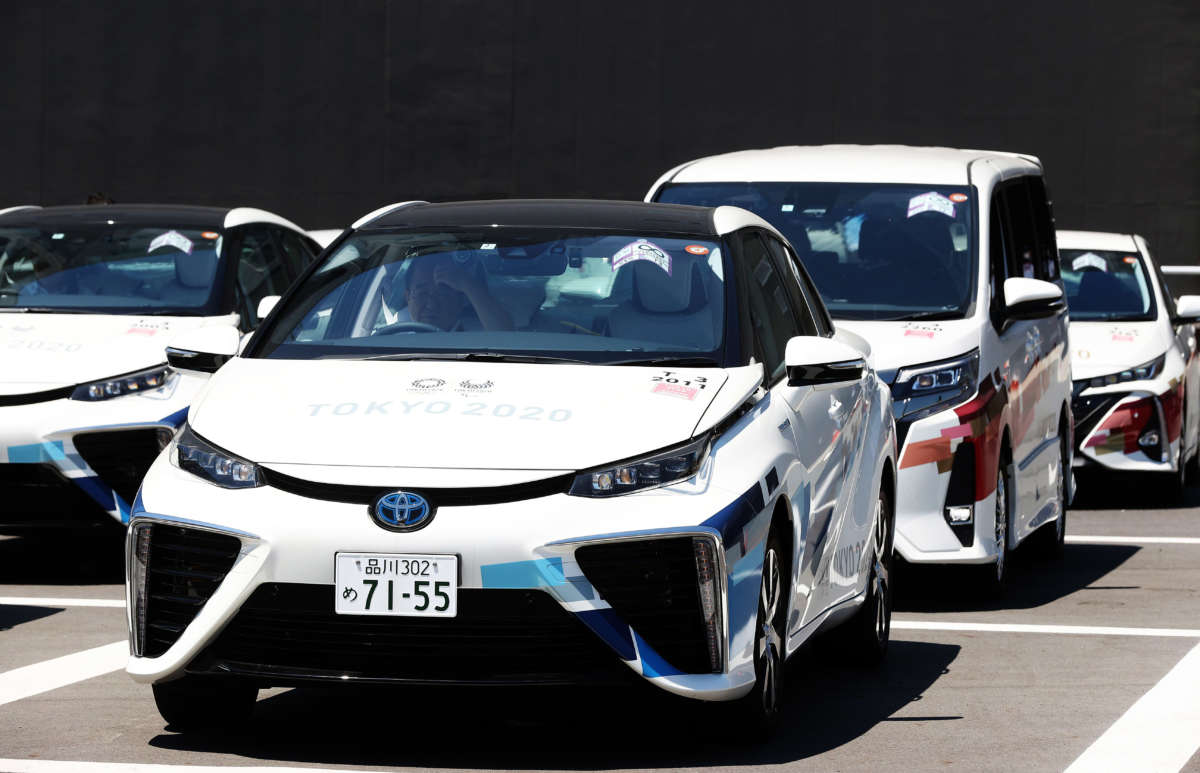Toyota Olympic fleet cars parking outside the Olympic Village ahead of the Tokyo 2020 Olympic Games on July 21, 2021, in Tokyo, Japan.