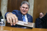 Sen. Joe Manchin arrives for a Senate Energy and Natural Resources Committee hearing on Thursday, June 24, 2021, in Washington, D.C.