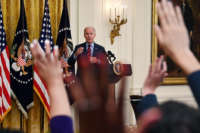 Joe Biden calls on reporters raising their hands