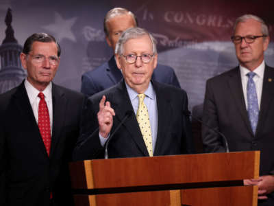 Senate Minority Leader Mitch McConnell (R-Kentucky), joined by fellow Republican Senators, speaks on a proposed Democratic tax plan during a press conference at the U.S. Capitol on August 04, 2021 in Washington, D.C.