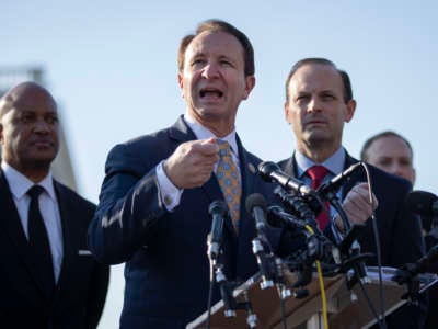Louisiana Attorney General Jeff Landry stands with other Attorneys General