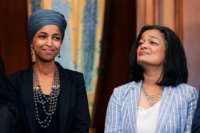 Reps. Omar and Jayapal stand next to eachother