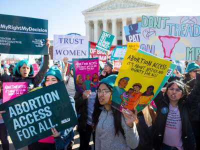 Pro-choice activists supporting legal access to abortion protest during a demonstration outside the Supreme Court in Washington, D.C., on March 4, 2020.