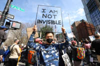 Asian Americans are gathered at the City Hall to protest anti-Asian racism following the Atlanta Spa shooting, in New York City, New York, on March 27, 2021.