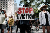 Activists hold a protest against evictions near City Hall on August 11, 2021, in New York City.