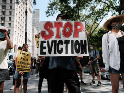 Activists hold a protest against evictions near City Hall on August 11, 2021, in New York City.