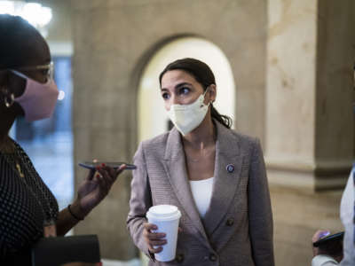 Rep. Alexandria Ocasio-Cortez (D-New York) speaks to a reporter on Capitol Hill on Thursday, July 29, 2021 in Washington, D.C.