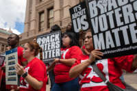 Demonstrators are gathered outside of the Texas State Capitol during a voting rights rally on the first day of the 87th Legislature's special session on July 8, 2021 in Austin, Texas.