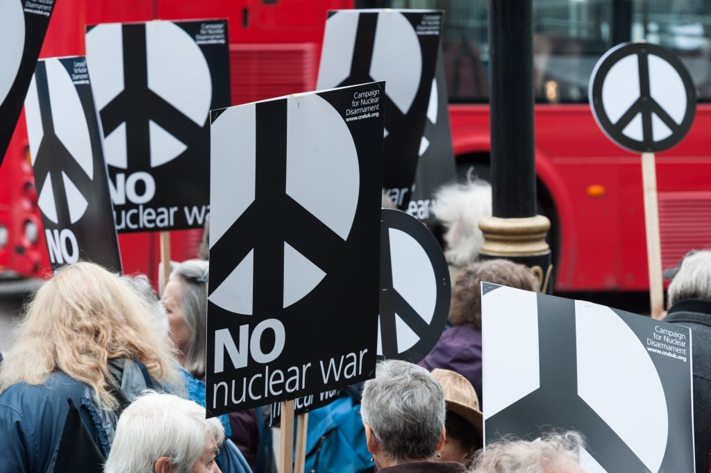 Anti-nuclear weapons activists from Campaign for Nuclear Disarmament stage a protest outside Westminster Abbey on May 3, 2019, in London, England.