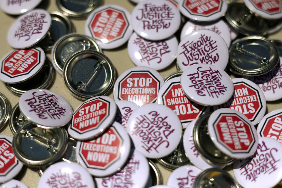 Buttons with anti-death penalty slogans are seen during a vigil against the death penalty in front of the U.S. Supreme Court on June 29, 2021, in Washington, D.C.