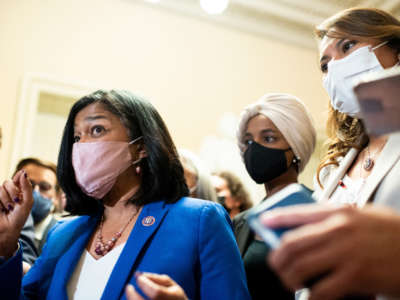 From left, Progressive Caucus chair Rep. Pramila Jayapal, Rep. Ilhan Omar and Rep. Veronica Escobar speak to reporters after meeting with Speaker of the House Nancy Pelosi on the infrastructure and reconciliation bills on September 30, 2021.