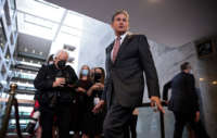 Sen. Joe Manchin arrives at a press conference outside his office on Capitol Hill on October 6, 2021, in Washington, D.C.