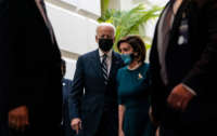 President Joe Biden and Speaker of the House Nancy Pelosi depart a House Democratic Caucus meeting in the U.S. Capitol on October 28, 2021, in Washington, D.C.