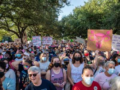 Protesters take part in the Women's March and Rally for Abortion Justice in Austin, Texas, on October 2, 2021.