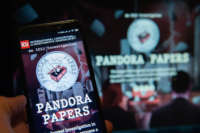 Pandora Papers website seen displayed on a smartphone.