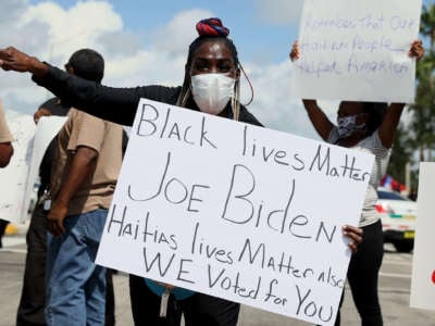 Protesters denounce the expulsion of Haitian refugees from Del Rio, Texas, on September 22, 2021, in Miami, Florida.