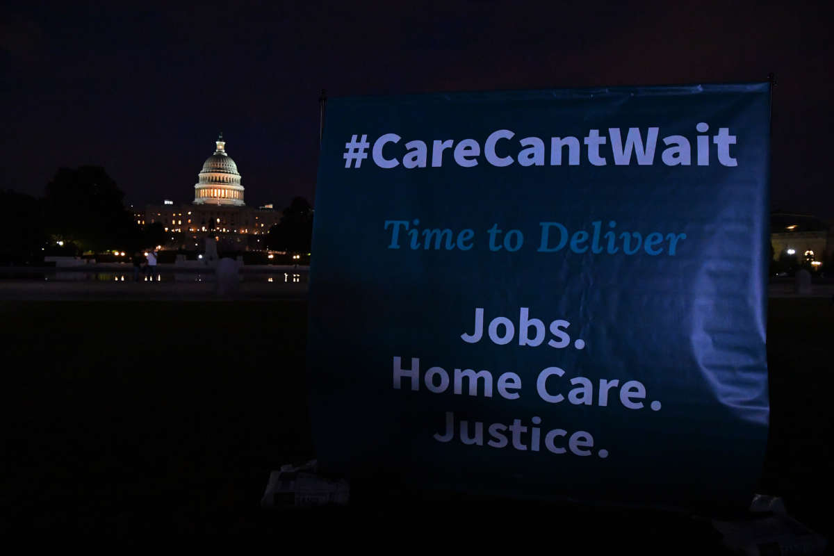 Disability rights activists and caregiving advocates hold a vigil in front of the US Capitol to urge Congress to include full federal funding for home and community based care services in President Biden’s Build Back Better budget package on October 6, 2021, in Washington, D.C.