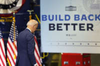 President Joe Biden prepares to walk off a stage after giving a speech on his Bipartisan Infrastructure Deal and Build Back Better Agenda at the NJ Transit Meadowlands Maintenance Complex on October 25, 2021, in Kearny, New Jersey.