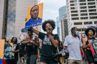 People celebrate the sentencing of former Minneapolis police officer Derek Chauvin on June 25, 2021, in Minneapolis, Minnesota.