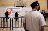 People line up to get a COVID-19 vaccination shot at Grand Central Terminal on May 12, 2021, in New York City.